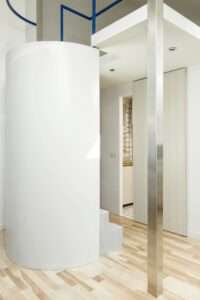 compact-white-and-wood-apartment-in-milan-maximizes-space-in-style