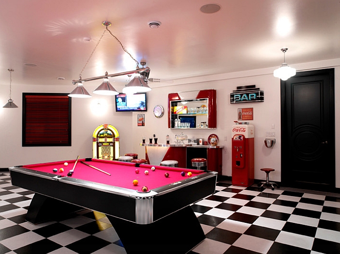 Media and game room of a bachelor pad with the Coke machine