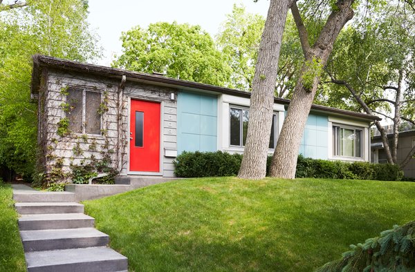 Sitting alongside five other Lustron homes on Nicollet Avenue in Minneapolis, this rare prefab is cladded in sleek "surf-blue
