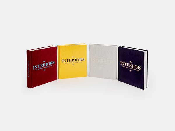 Interiors: The Greatest Rooms of the Century from Phaidon is available as a single book in four different, luxurious velvet versions in of-the-moment colors: Midnight Blue, Merlot Red, Platinum Gray, and Saffron Yellow.