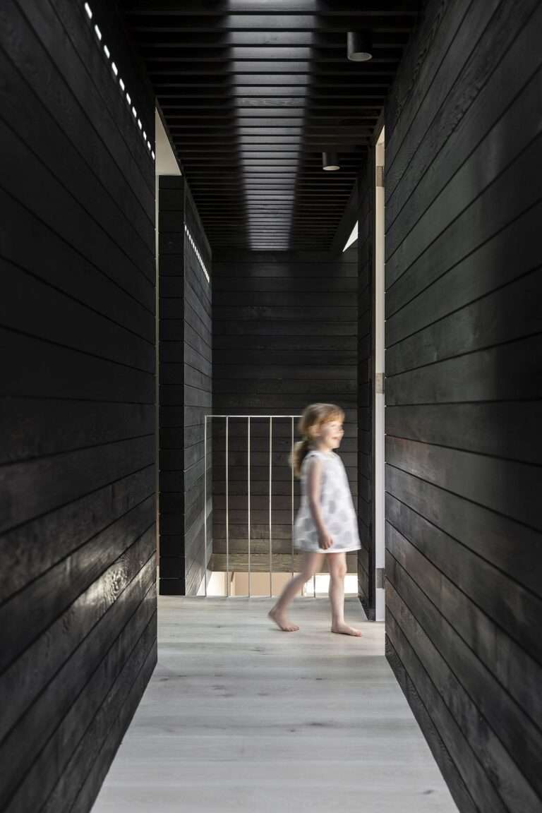 Black Twin Peaks Cottage Style Structure in the Rear Extends Aging Aussie Home