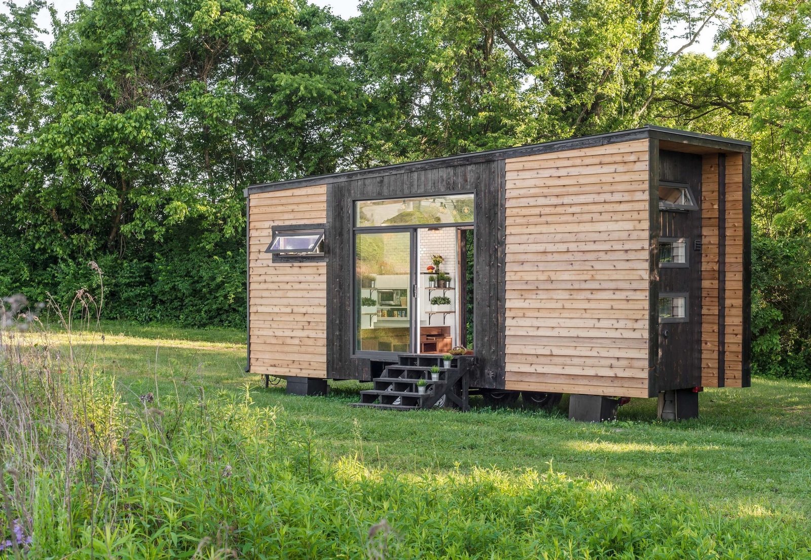 New Frontier Tiny Homes’s Alpha, is one of the fanciest tiny homes around. The 240-square-foot modern design is super functional and good looking to boot. They also have a larger model, Escher, a model that at around 300 square feet, is more spacious and offers two bedrooms.