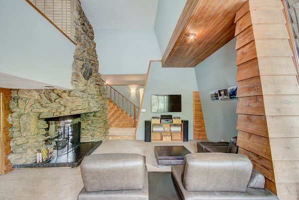 A cathedral ceiling in the living room is