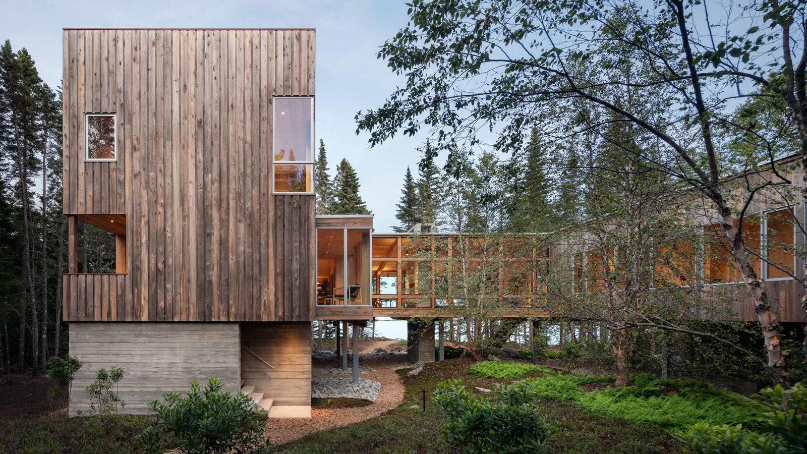 "The homeowner describing that he loved the mossy, fern understory brought the idea to my mind to be up in the trees," says architect Russ Tyson.