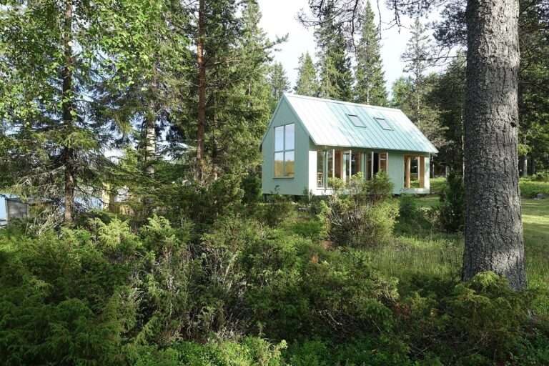 Tiny Light Green Wooden Summer Cottage in Sweden is an Efficient Showstopper