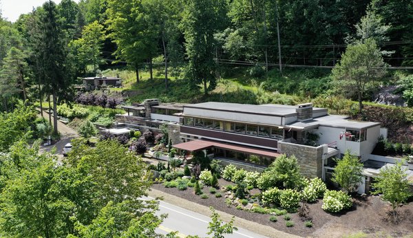 A recent photo shows the main structure and adjacent cottage, both of which were listed on the National Register of Historic Places in 2007. At that point in time, this view of the property would have been hidden by dozens of hemlocks encroaching on the building.