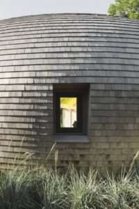 colored-skylights-help-tell-time-in-this-curvaceous-hamptons-home