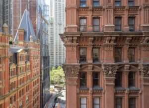before-after-a-converted-office-in-nyc-ditches-bland-interiors-for-brick-and-steel