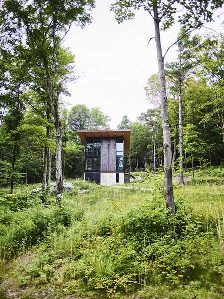 This Cor-Ten Steel Cabin Is a Woodland Escape for the Generations