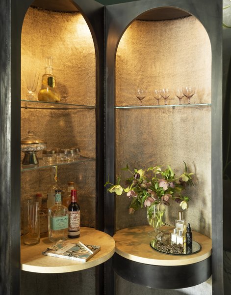 "We were inspired by a vintage piece of furniture and loved the idea of reinterpreting it as bar and vanity combination,