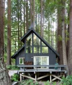 this-pristine-a-frame-cabin-glows-like-a-lantern-in-a-redwood-forest