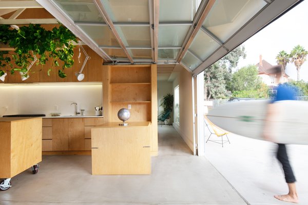 Anchoring a multi-family property in Chula Vista is a 1,200-square-foot garage that Ramiro Losada-Amor of Modern Granny Flat transformed into an ADU for Jorge Cuevas Antillón and Ruben Martínez. The garage door is from Coastal Garage Doors.