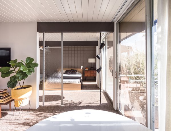 William Krisel designed the Ocotillo Lodge, a hotel that features a number of his signature design moves: post-and-beam construction, walls of glass, and seamless indoor/outdoor connections. Pictured here is one of the hotel’s bungalows.