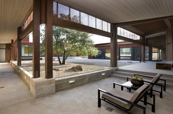 A veranda connects the corner between two of the three pavilions. According to Fisher's website, the interior courtyard was designed to "protect the residents from harsh wind and sun while providing an alternative view of landscape, which is contemplative, serene, and quiet."