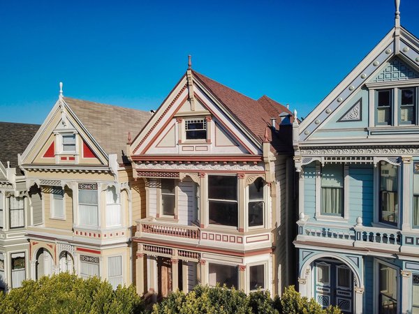 A closer look at the facade of 714 Steiner, pictured here in the middle. The term "Painted Ladies" was first coined by Elizabeth Pomada and Michael Larsen in their 1978 book Painted Ladies: San Francisco's Resplendent Victorians. The phrase is now commonly used to describe polychromatic Victorian or Edwardian homes in other American cities.