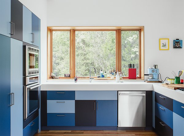 A fresh coat of paint can work wonders for a tired kitchen, but the original finish of the doors could limit your options. A laminate door will not take paint as well as an unfinished or sanded-down wood or MDF door, for example.