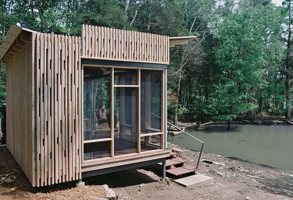 For the Knoxville-based CEO of environmentally-focused marketing firm the Shelton Group, building an off-the-grid lakefront pavilion in Sharps Chapel, Tennessee, wasn’t so simple. With the help of architect Brandon Pace, she built a small prefabricated cabin on a 