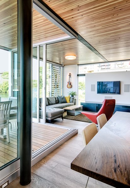 Floor-to-ceiling windows in the main living space overlook Lake Union.