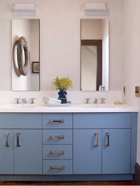 My boys’ bathroom is one of my faves, as I love the color of the blue cabinets. And no, it rarely looks this pristine.