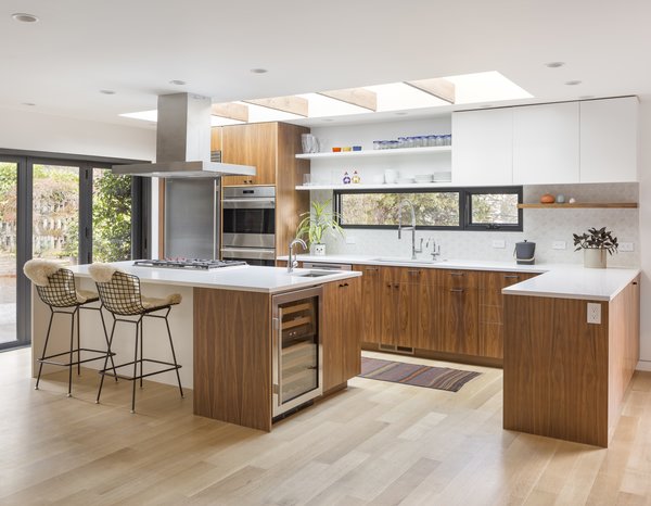 Portland-base pastry chef Andrea Nicholas purchased a 1953 midcentury ranch whose 2,500 square feet needed "a lot of TLC." Nicholas hired architect Risa Boyer to design the renovation, which involved opening up the kitchen to the dining room and creating a contemporary open-plan living space.