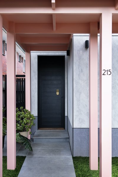 The smooth cladding on the front facade is Cemintel Barestone. 