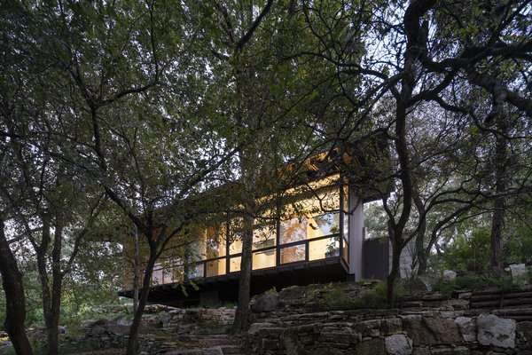 This Spectacular Texas Retreat Cascades Down a Wooded Hillside