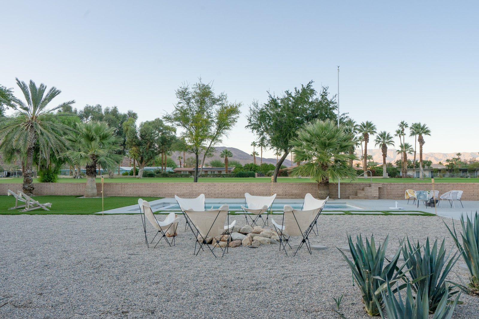 The stone-edged fire pit is a family favorite. "We do s'mores around the fire every time we go, walk the golf course at night, and love watching the sunsets against the pink mountains," she says. 