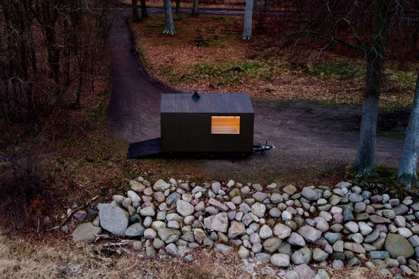 Measuring 16 feet long, the Scandinavian Sauna by Native Narrative is built on a trailer frame for easy portability.