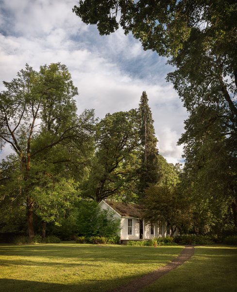 Sustainable building practices were key to the cottage’s rebirth. The home’s green roof system consists of a vinyl membrane topped with small trays filled with ferns and mosses from the nearby Columbia River Gorge.