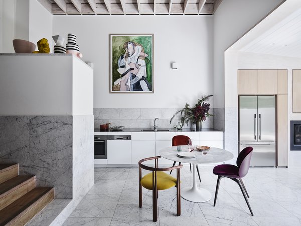 The home’s philosophy was inspired by the works of Alvar Aalto and Louis Kahn. The use of locally available and low-cost pine and Carrara stone gives it an almost Scandinavian sensibility, which the couple describe as 