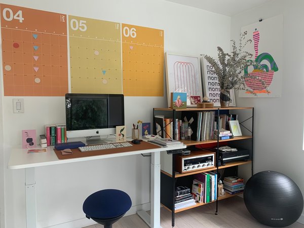 Poketo co-founder and chief creative officer Angie Myung converted her guest room into her home office, incorporating cheery details to keep morale up.