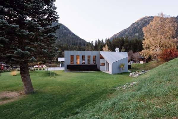 A Sculptural Home in the Dolomite Mountains Frames a Majestic Silver Fir