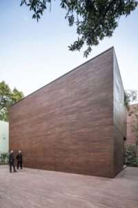 an-introspective-brick-home-in-mexico-city-wraps-around-a-jungle-like-courtyard