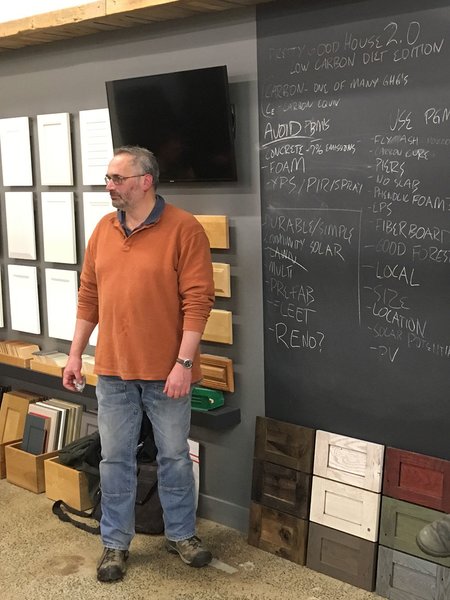 Homebuilder Dan Kolbert moderates a Pretty Good House meeting at Performance Building Supply in Portland, Maine. Here, they discuss ways to lower a home’s carbon footprint. 