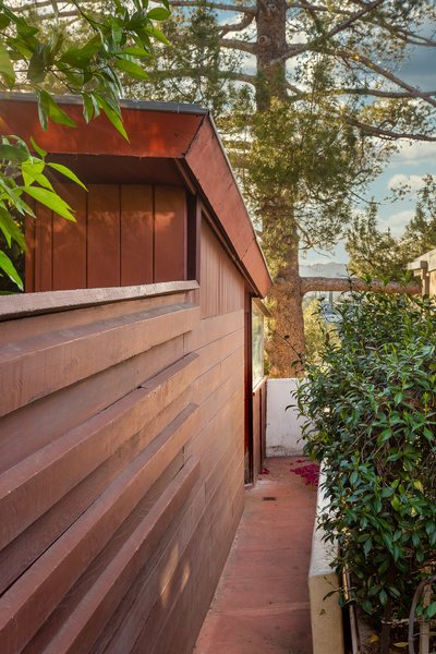 Perched on a steep hillside in Silver Lake, the John and Mary Lautner Residence remains in nearly original condition. The redwood-clad home cascades down a steep slope—a challenge Lautner approached with the intention "to build something of the hill, rather than in spite of the hill."