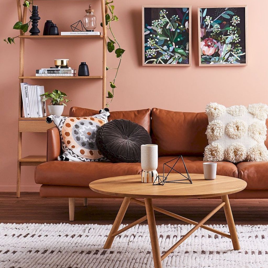 living room with brown accents and peach walls