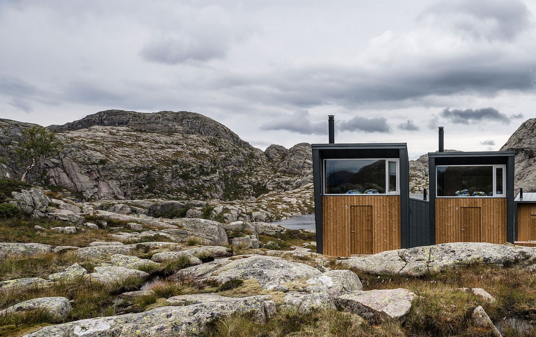 Rolled zinc and wood shape the exterior of the cabins