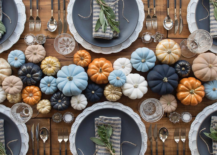 an array of painted pumpkins as a thanksgiving centerpiece