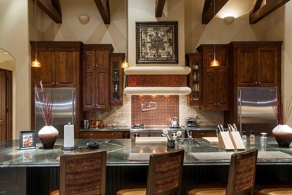Sparkling copper backsplash for modern kitchen with dining space [Design: Fisher Custom Homes]