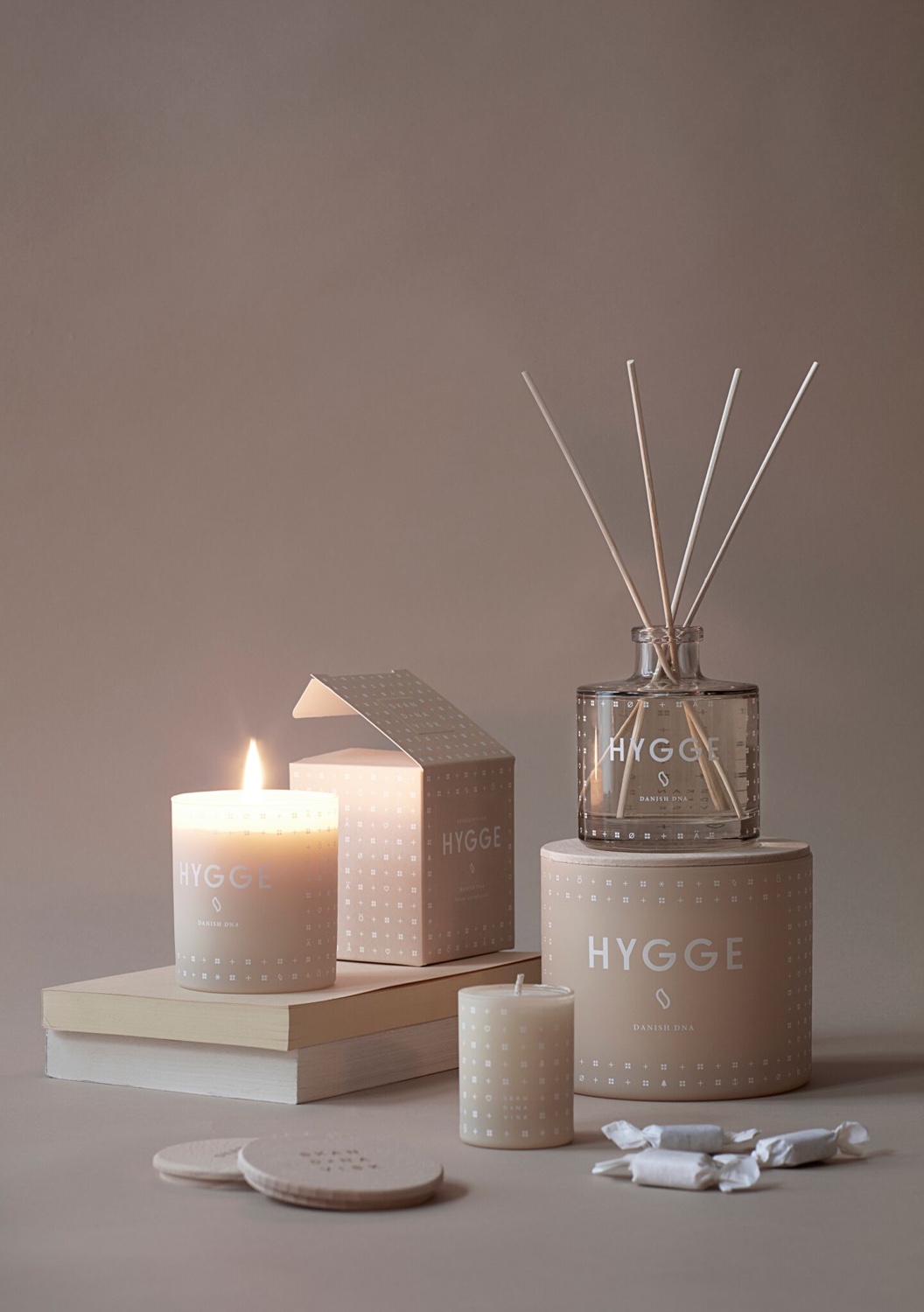Hygge scented candles and diffuser. Image © 2016 SKANDINAVISK.