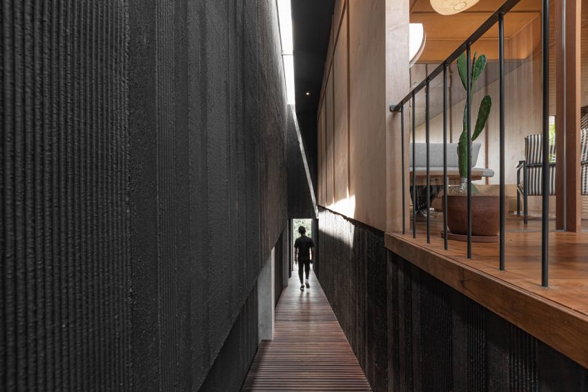 Hallway inside black villa in Indonesia