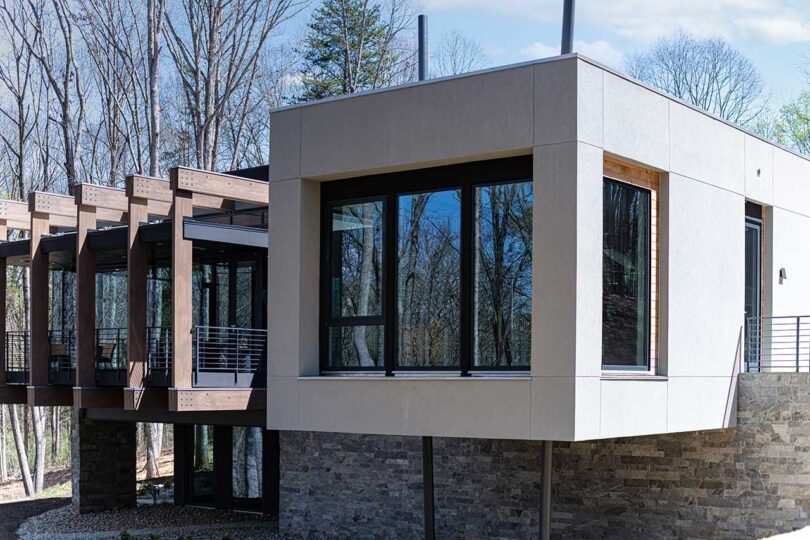 corner exterior view of modern house with cantilevered rooms