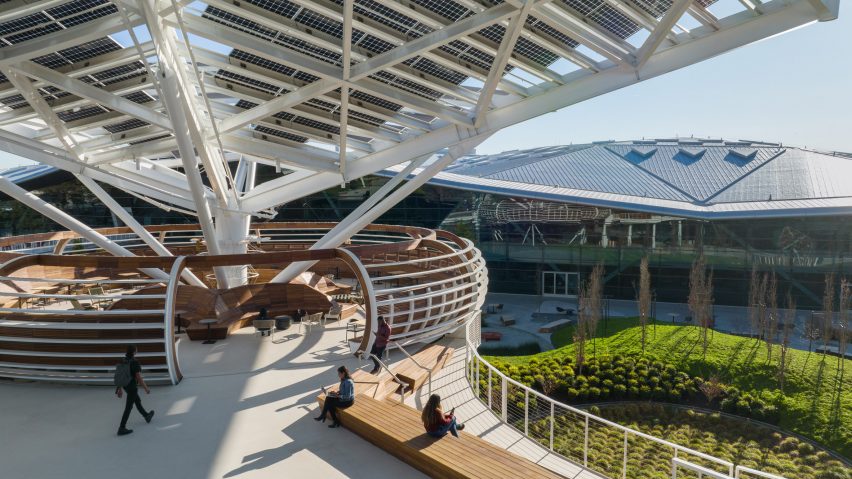 An elevated seating area with wooden benches