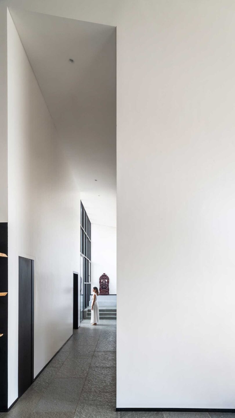 tall white hallway in modern home