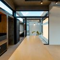 House in Alto Verde / Estudio Giraudo - Interior Photography, Kitchen, Table, Chair, Beam, Windows