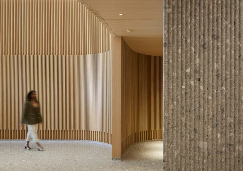 Wooden louvres and terrazzo in office lobby