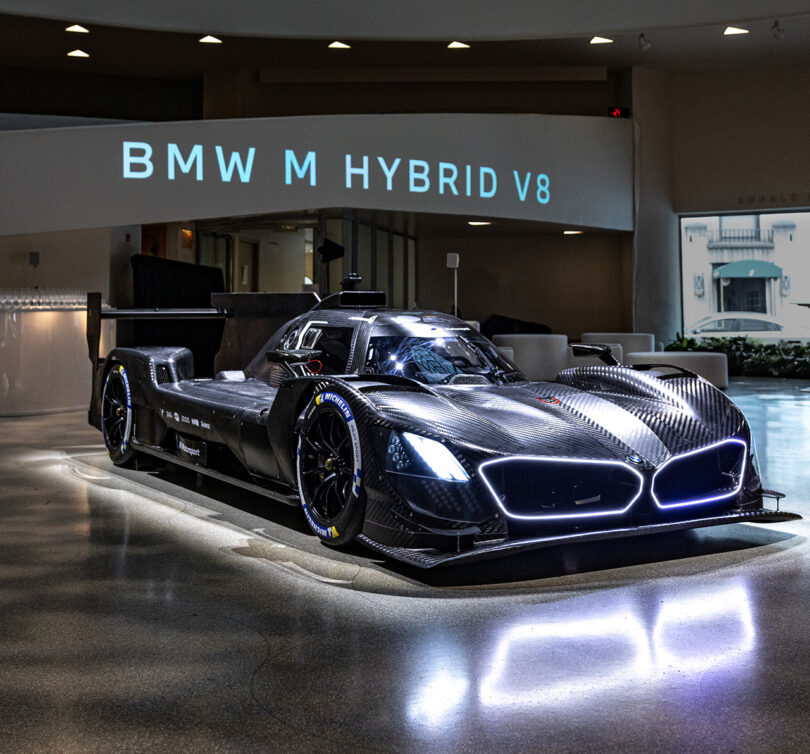 BMW M Hybrid V8 race car parked inside the Guggenheim Museum.