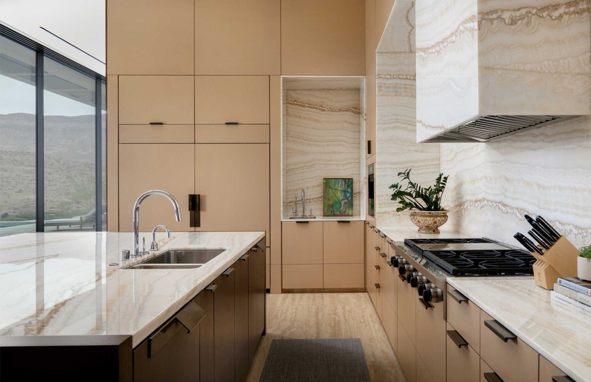 This modern kitchen has a palette that complements the desert colors found outside.