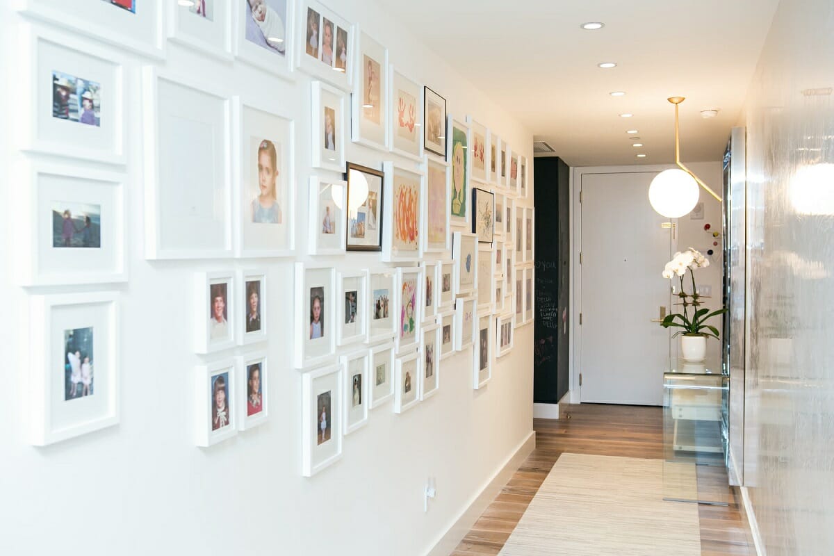 Entryway gallery wall ideas in a sophisticated foyer