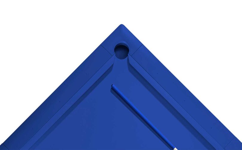 corner down view of modern cobalt blue pool table